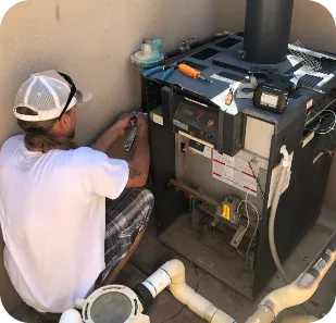 a pool expert repairing a pool pump part in Tucson, AZ